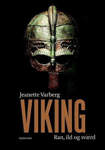 Forsiden af bogen "Viking - løb, ild og sværd" af Jeanette Varberg har en vikingehjelm på sort baggrund. Forfatterens navn står øverst, og titlen med fokus på vikingetidens historie er tydeligt vist med store, fede bogstaver. Udgivet af Gyldendal.