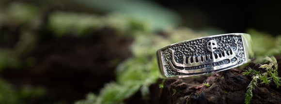 fingerringe af sølv med flettet design, thorshammer og vikingemønstre
